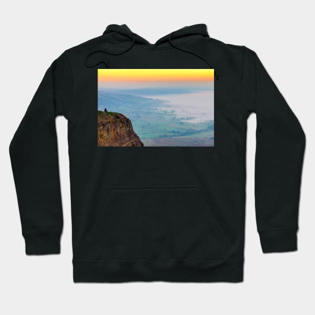 Man meditating at sunrise on Mam Tor, Castleton, Derbyshire,UK Hoodie by Itsgrimupnorth